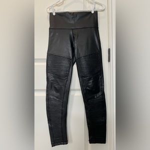 Gently used 7 For All Mankind faux leather motto fleece lined Black leggings.
